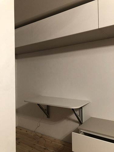 Шкаф-кровать с зонами для хранения 32